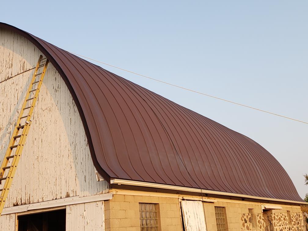Brown barn roof, brown metal roof, barn metal roof, metal roof, tin roof, steel roof, round roof barn metal, Culpitt roofing, Wisconsin, Minnesota