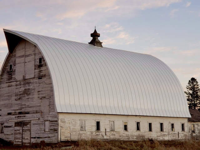 White steel roof, metal roof, tin roof, white barn with white roof, white roof, steel roof, Culpitt roofing, Wisconsin, Minnesota