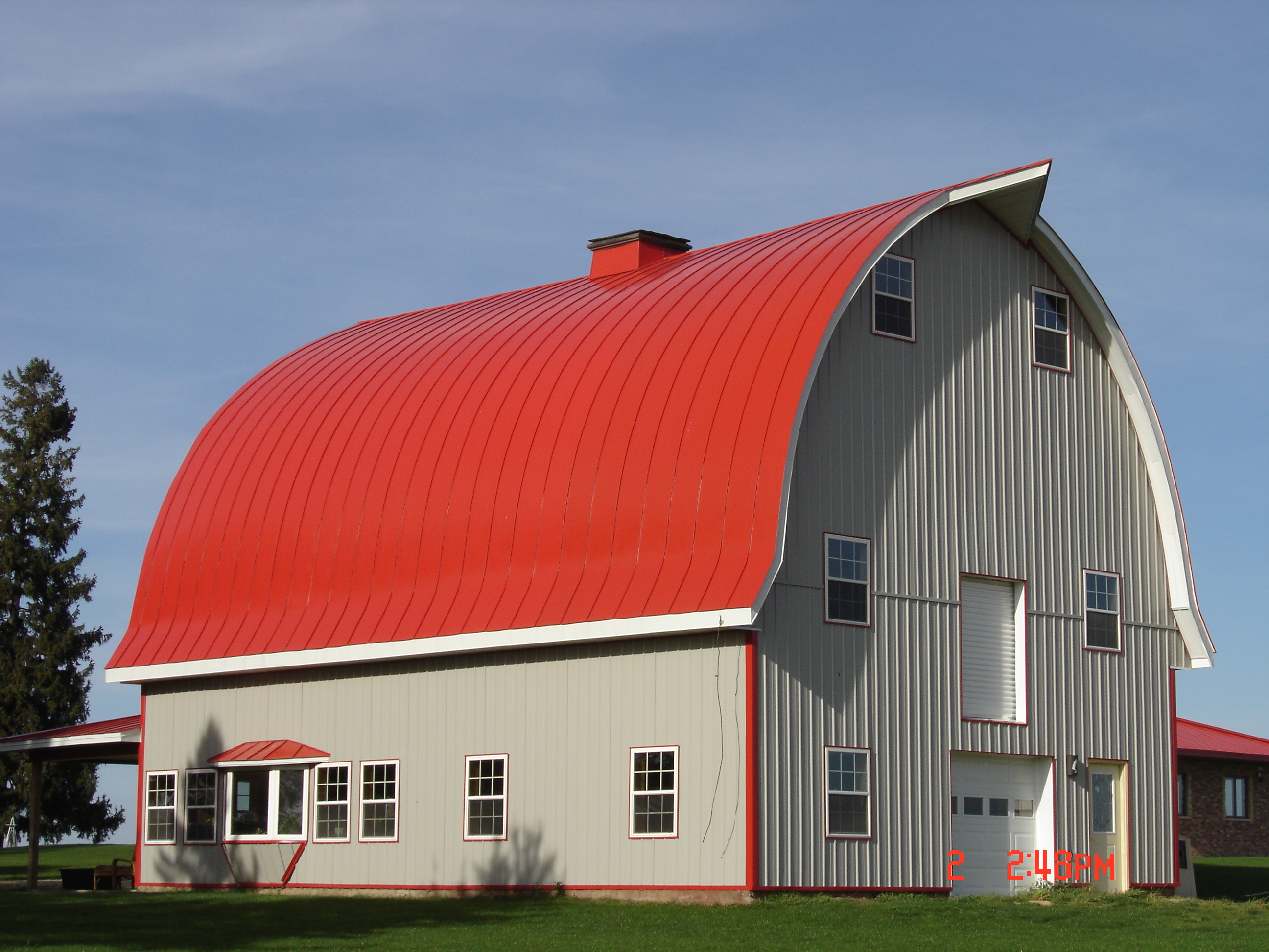 red roof, red metal, double lock standing seam, sheet metal, metal roofing, gothic barn, agricultural, Culpitt roofing, Wisconsin, Minnesota