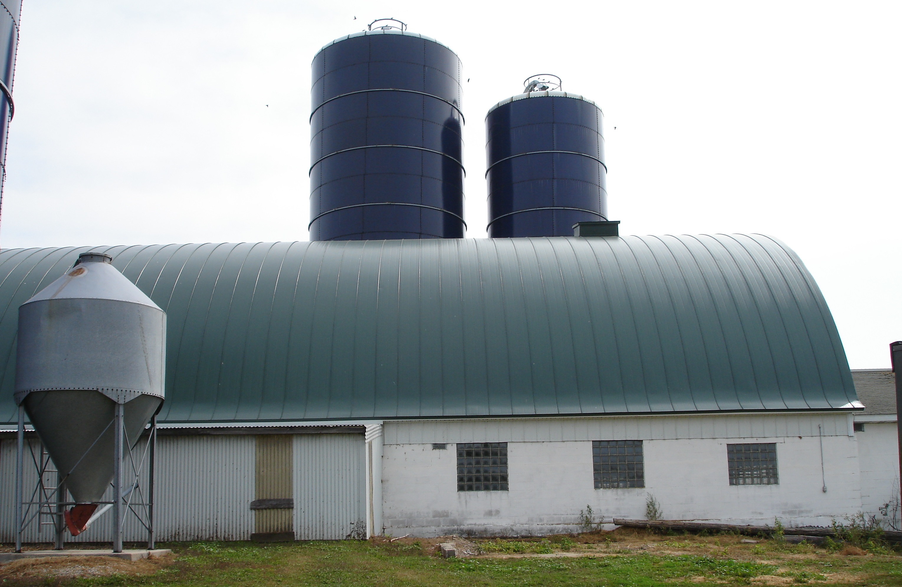 green roof, green metal, double lock standing seam, sheet metal, metal roofing, hip barn, agricultural, Culpitt roofing, Wisconsin, Minnesota