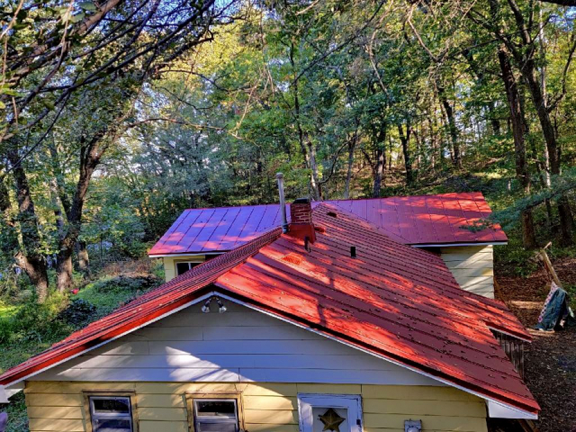 red roof, red metal, double lock standing seam, sheet metal, metal roofing, residential, Culpitt roofing, Wisconsin, Minnesota